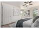 Bright bedroom features natural light, a ceiling fan and neutral decor at 4354 N 82Nd St # 183, Scottsdale, AZ 85251