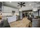 Open-concept kitchen featuring stainless steel appliances and views into the dining area at 5710 E Camelback Rd, Phoenix, AZ 85018
