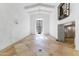 Bright living room features high ceilings, tile floors, and a wall of windows at 5710 E Camelback Rd, Phoenix, AZ 85018