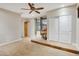 Bonus room with a ceiling fan, recessed lights, window, closet and hard surface floors at 6206 W Buckhorn Trl, Phoenix, AZ 85083
