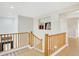 Staircase featuring wood railing and a niche with decorative items, leading to upper level at 6206 W Buckhorn Trl, Phoenix, AZ 85083