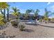 Expansive backyard featuring a pool and desert landscaping at 6938 E Lomas Verdes Dr, Scottsdale, AZ 85266