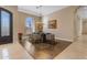 Elegant dining room with decorative lighting, hardwood floors, and ample space for entertaining at 6938 E Lomas Verdes Dr, Scottsdale, AZ 85266