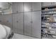 Garage with organized shelving and storage cabinets at 6938 E Lomas Verdes Dr, Scottsdale, AZ 85266