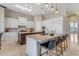 Gourmet kitchen with marble countertops, twin islands, and stainless steel appliances at 6938 E Lomas Verdes Dr, Scottsdale, AZ 85266
