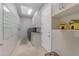 Laundry room featuring plenty of storage and pet themed decorations at 6938 E Lomas Verdes Dr, Scottsdale, AZ 85266