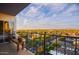 A balcony with seating provides picturesque city views at 805 N 4Th Ave # 903, Phoenix, AZ 85003