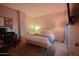 Comfortable bedroom features a bed, desk, and warm lighting at 805 N 4Th Ave # 903, Phoenix, AZ 85003