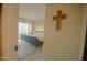 Bedroom doorway featuring a bedroom with balcony and a decorative cross at 805 N 4Th Ave # 903, Phoenix, AZ 85003