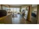 Spacious living room featuring modern decor, a balcony, and a partial view of a bedroom at 805 N 4Th Ave # 903, Phoenix, AZ 85003