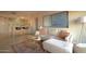 Bright living room showcasing a comfortable white sofa, artwork, and bar seating at 805 N 4Th Ave # 903, Phoenix, AZ 85003