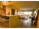 Sunlit living room featuring a kitchen bar, balcony access, and stylish decor at 805 N 4Th Ave # 903, Phoenix, AZ 85003