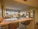 Open-concept living space with breakfast bar and city views at 805 N 4Th Ave # 903, Phoenix, AZ 85003