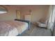 Cozy bedroom featuring a stylish chair, dresser, and a queen size bed at 805 N 4Th Ave # 903, Phoenix, AZ 85003