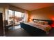 Bright bedroom with a large window and balcony overlooking a skyline at 805 N 4Th Ave # 903, Phoenix, AZ 85003