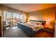 Bright bedroom with a large window and balcony overlooking a skyline at 805 N 4Th Ave # 903, Phoenix, AZ 85003