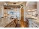 Charming kitchen features granite countertops, custom cabinets, and stainless steel appliances at 9161 E Superstition Mountain Dr, Gold Canyon, AZ 85118