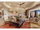 Bright living area seamlessly flows into the kitchen with hardwood flooring and lots of light at 9161 E Superstition Mountain Dr, Gold Canyon, AZ 85118