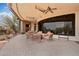 Large outdoor patio with seating area and desert views, perfect for relaxing at 9161 E Superstition Mountain Dr, Gold Canyon, AZ 85118