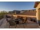 Spacious rooftop patio with comfortable seating and stunning mountain views at 9161 E Superstition Mountain Dr, Gold Canyon, AZ 85118