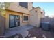 Backyard patio with air conditioning unit and sliding glass door at 921 W University Dr # 1099, Mesa, AZ 85201