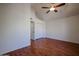 Bedroom with hardwood floors, white walls, and a closet at 921 W University Dr # 1099, Mesa, AZ 85201