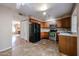 Kitchen featuring wood cabinets and stainless steel appliances at 921 W University Dr # 1099, Mesa, AZ 85201