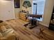 Bedroom includes exercise machine, dresser, shelving unit, and comfortable couch at 10309 W Twin Oaks Dr, Sun City, AZ 85351