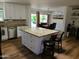 Bright kitchen featuring granite countertops, stainless steel appliances, and seamless access to the dining area at 10309 W Twin Oaks Dr, Sun City, AZ 85351