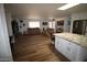 Spacious, open-concept floor plan with living room and kitchen featuring modern finishes and decor at 10309 W Twin Oaks Dr, Sun City, AZ 85351