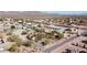 Panoramic aerial view of a residential area with spacious lots and desert landscaping in a serene desert setting at 10718 E Fenimore Rd, Mesa, AZ 85207