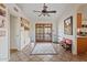Inviting foyer with tile flooring, a decorative rug, and a view into other rooms at 10718 E Fenimore Rd, Mesa, AZ 85207