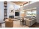 Spacious living room with fireplace, clerestory windows, and comfortable seating at 11199 E Prospect Point Dr, Scottsdale, AZ 85262
