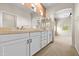 Bathroom has double sinks with a large mirror and vanity at 11500 E Cochise Dr # 2067, Scottsdale, AZ 85259