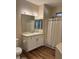Bright bathroom featuring a vanity with ample storage and a shower with curtain at 11500 E Cochise Dr # 2067, Scottsdale, AZ 85259