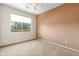 Bedroom features a large window providing ample natural light at 11500 E Cochise Dr # 2067, Scottsdale, AZ 85259
