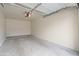 Spacious garage with an automatic door and concrete floors at 11500 E Cochise Dr # 2067, Scottsdale, AZ 85259