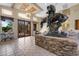 Elegant lobby featuring decorative sculpture and large windows that offer great views at 11500 E Cochise Dr # 2067, Scottsdale, AZ 85259