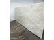 Large marble slab featuring a unique pattern and protective film, ready for countertop or design applications at 11500 E Cochise Dr # 2067, Scottsdale, AZ 85259