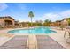 Inviting swimming pool with sun loungers and beautiful landscaping, creating a relaxing and luxurious outdoor experience at 11500 E Cochise Dr # 2067, Scottsdale, AZ 85259