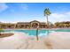 Gorgeous community pool with palm trees and luxurious lounge area, perfect for soaking up the sun at 11500 E Cochise Dr # 2067, Scottsdale, AZ 85259