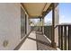 Balcony with dark railing, stucco siding, and view of neighborhood at 12343 W Essig Way, Peoria, AZ 85383
