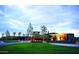 Expansive clubhouse with manicured lawn, showcasing modern architecture and inviting ambiance at 12343 W Essig Way, Peoria, AZ 85383