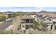 Charming two-story home featuring a balcony, a well-maintained yard, and a tile roof at 12343 W Essig Way, Peoria, AZ 85383