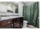 Bathroom featuring a vanity with drawers, granite counter tops and shower with shower curtain at 1250 E Eric Pl, Casa Grande, AZ 85122