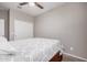 Comfortable bedroom with neutral colors and a wooden headboard with storage at 1250 E Eric Pl, Casa Grande, AZ 85122