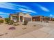 Charming single-story home featuring a two-car garage, neutral stucco, and low maintenance desert landscaping at 1250 E Eric Pl, Casa Grande, AZ 85122