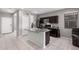 Modern kitchen featuring an island with a sink, stainless steel appliances and beautiful granite countertops at 1250 E Eric Pl, Casa Grande, AZ 85122