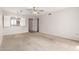 Spacious living room with neutral carpeting, offering a blank canvas for personalization and comfortable living at 131 N Higley Rd # 215, Mesa, AZ 85205