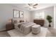 Bedroom with a ceiling fan, neutral decor, window, and warm, inviting atmosphere at 131 N Higley Rd # 215, Mesa, AZ 85205